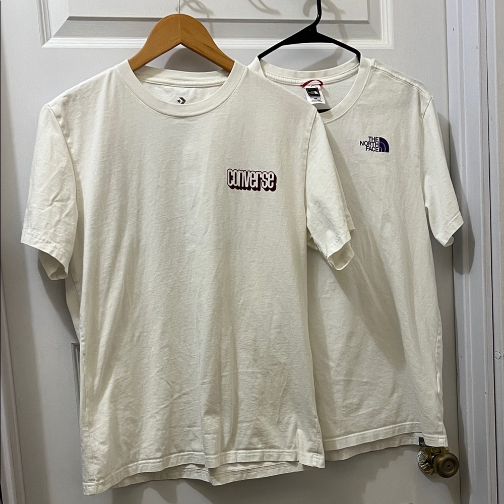 The North Face White Tee with Purple Logo and Converse white tee.
